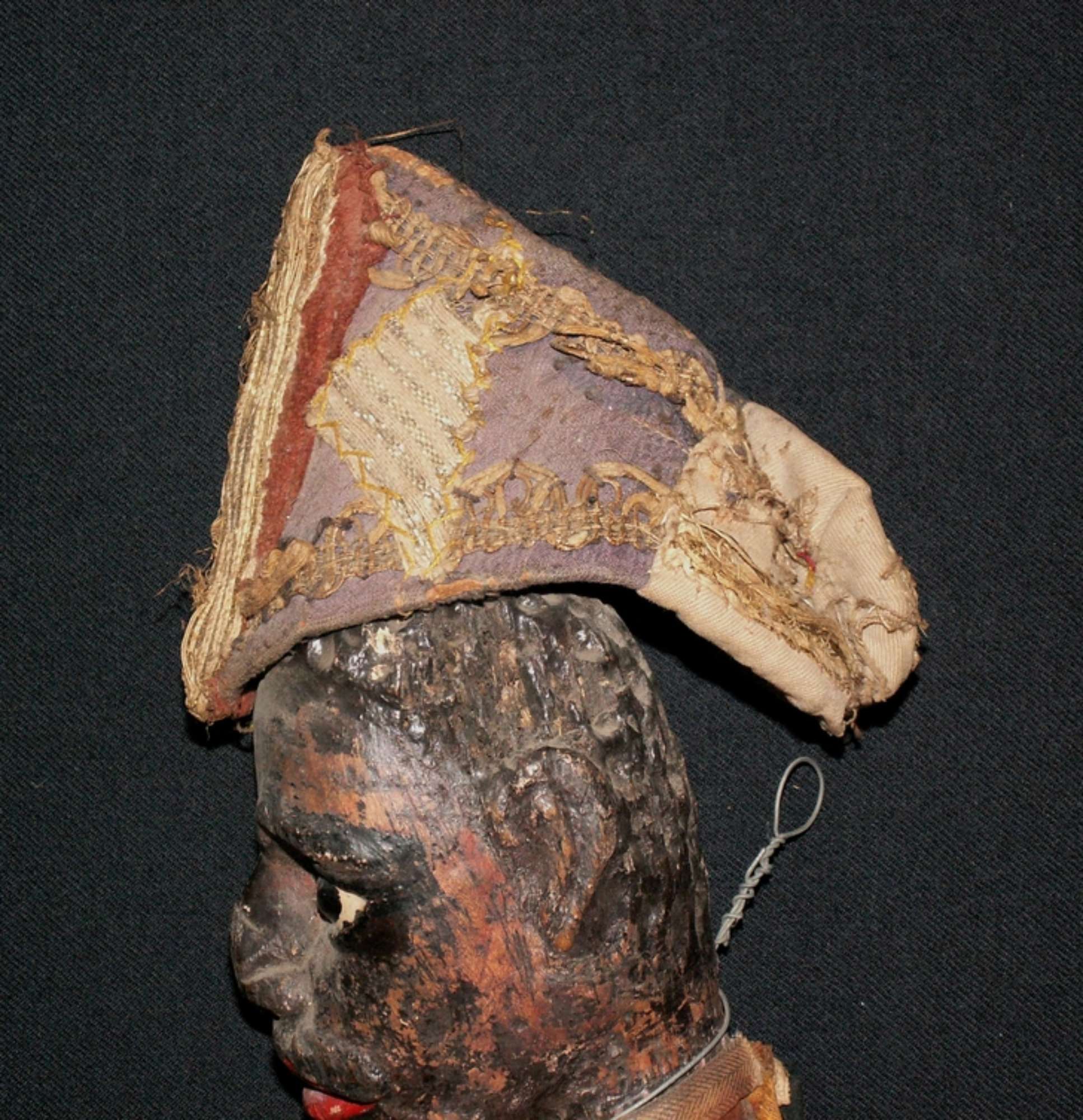 Particolare della testa prima del restauro